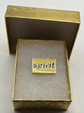 Spirit Airlines yellow wordmark lapel pin — modern cloisonné reproduction.