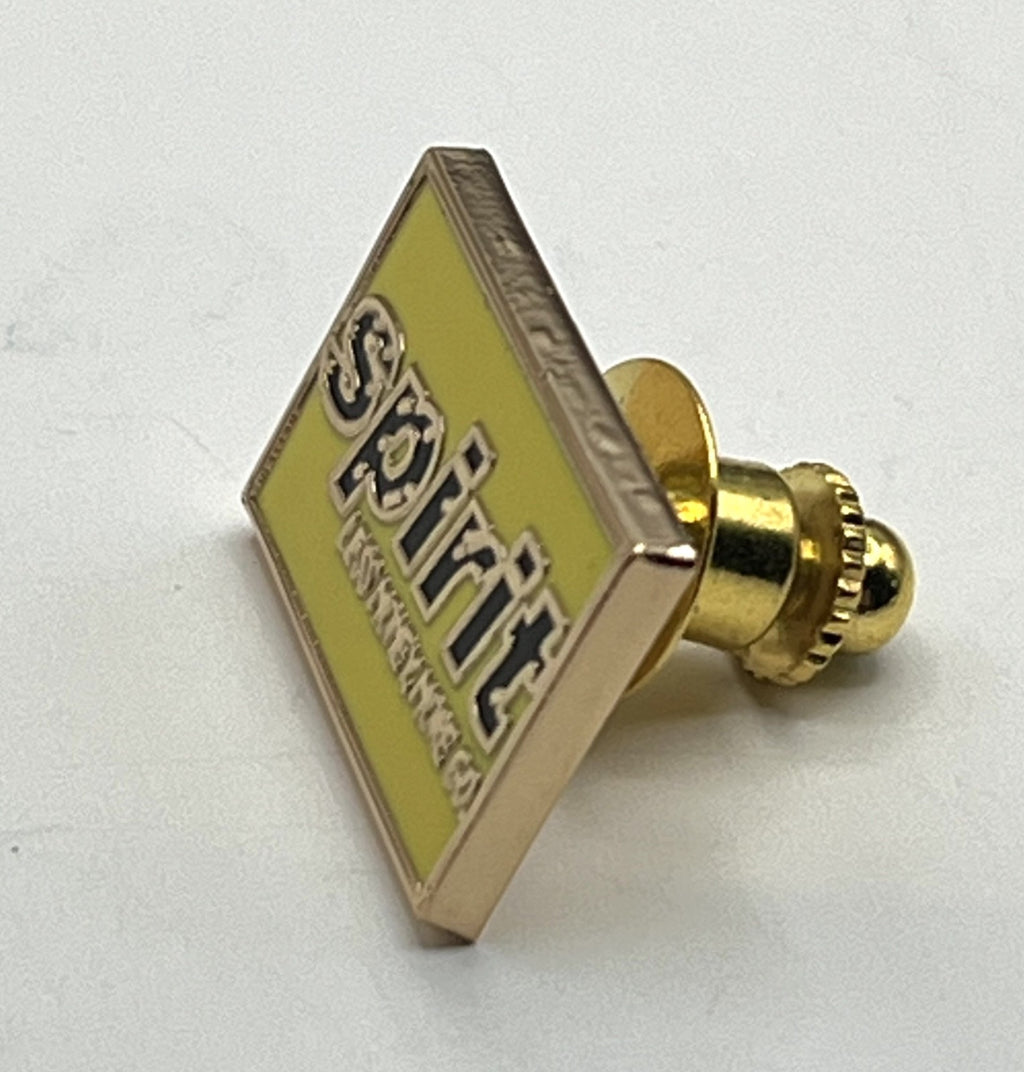 Spirit Airlines yellow wordmark lapel pin — modern cloisonné reproduction.