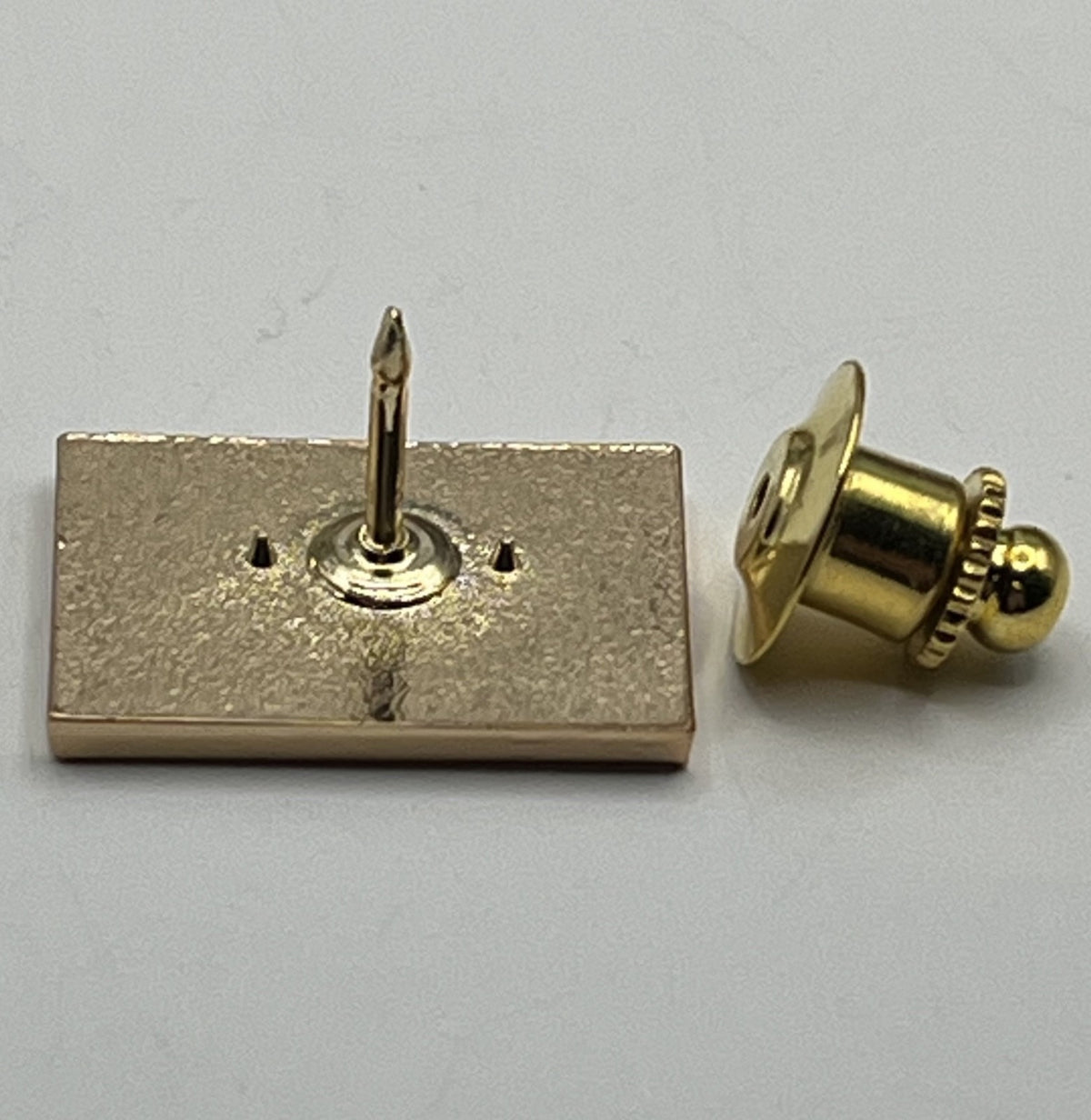 Spirit Airlines yellow wordmark lapel pin — modern cloisonné reproduction.