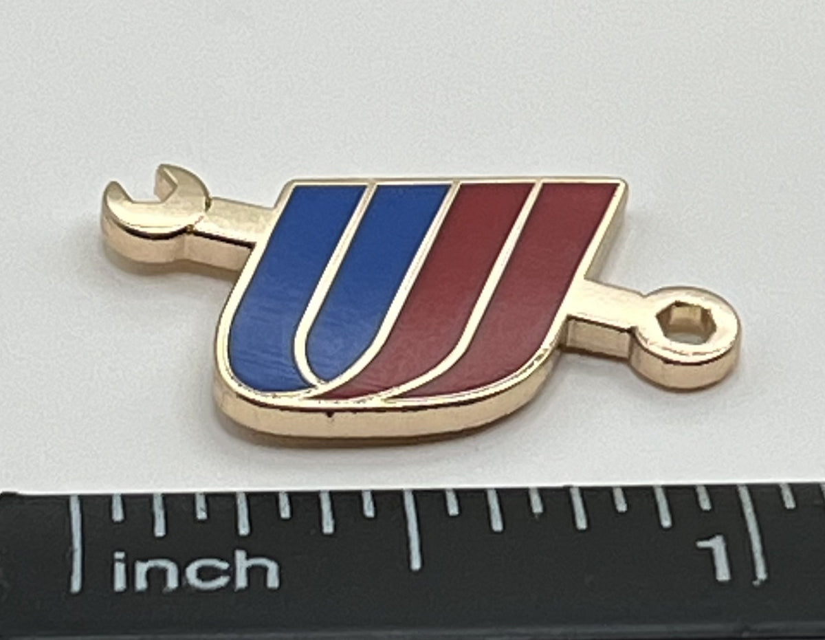 United Airlines tulip-and-wrench maintenance lapel pin — modern cloisonné reproduction