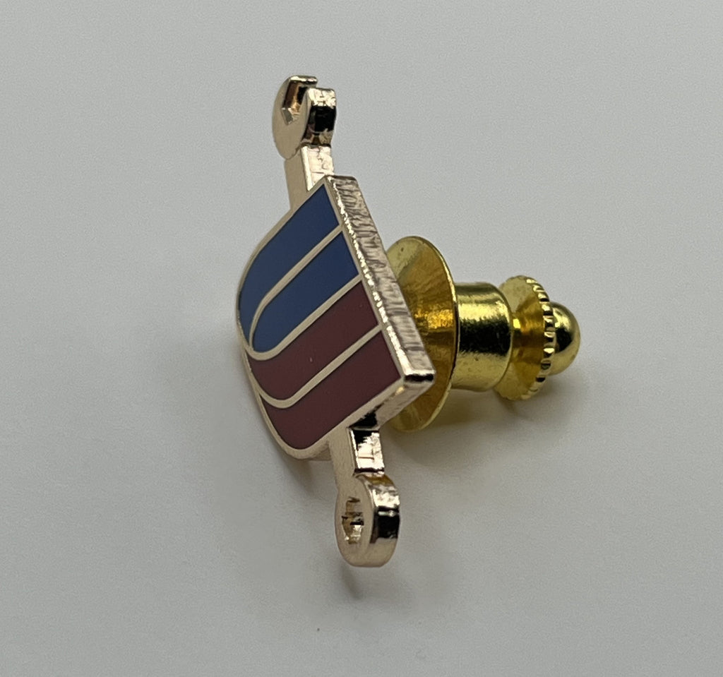 United Airlines tulip-and-wrench maintenance lapel pin — modern cloisonné reproduction