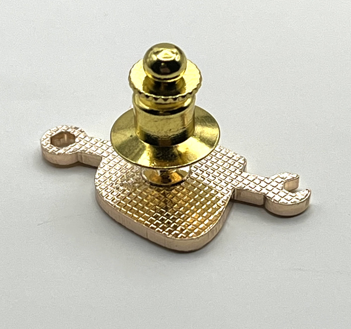United Airlines tulip-and-wrench maintenance lapel pin — modern cloisonné reproduction