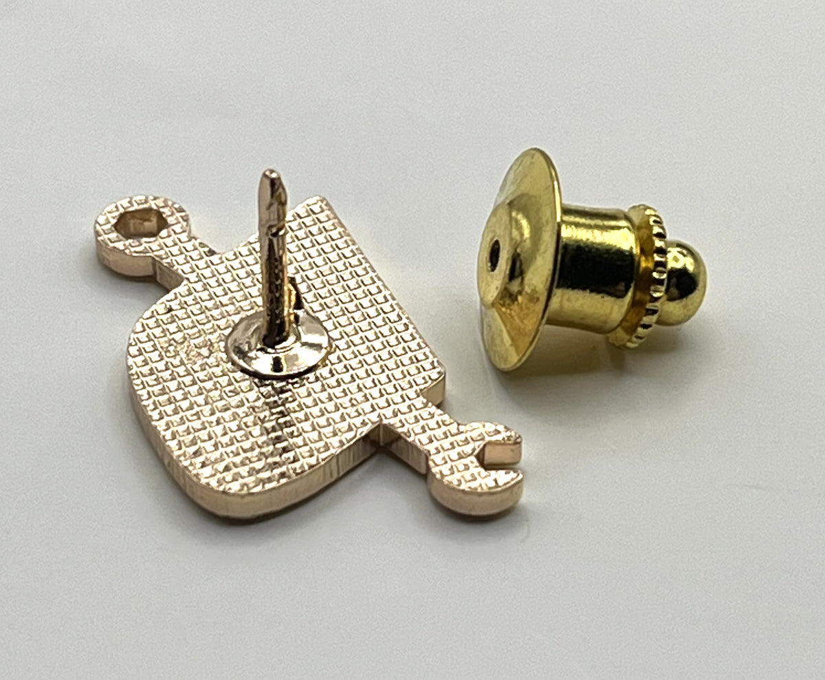 United Airlines tulip-and-wrench maintenance lapel pin — modern cloisonné reproduction