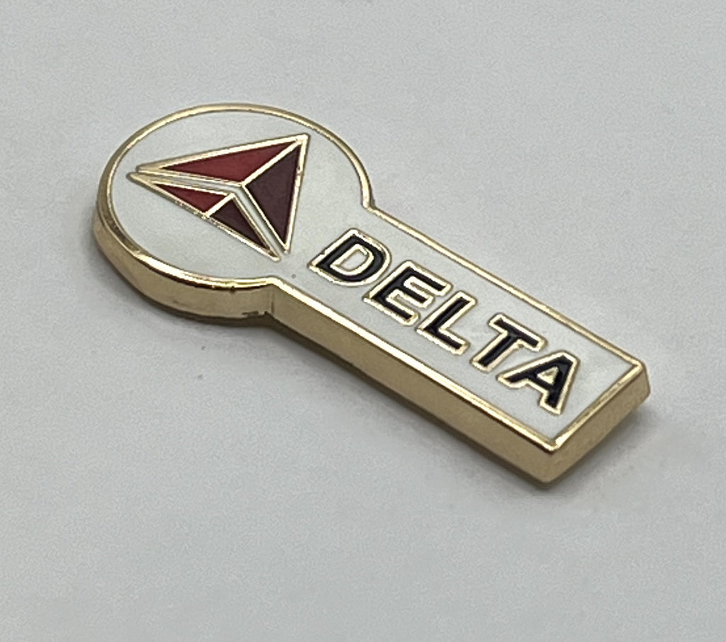 Delta Air Lines widget key-style lapel pin — modern cloisonné reproduction.