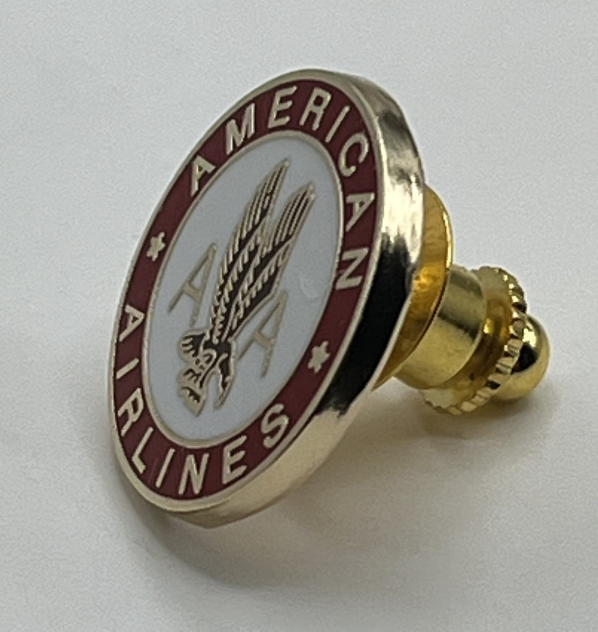 American Airlines eagle seal round lapel pin — modern cloisonné reproduction.
