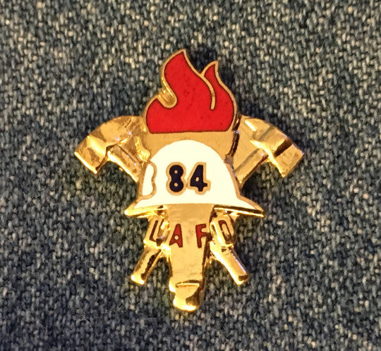 LAFD white helmet gold tone pin from the 1984 Los Angeles Olympics