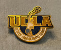 Tennis UCLA venue pin from the 1984 Los Angeles Olympics on original card