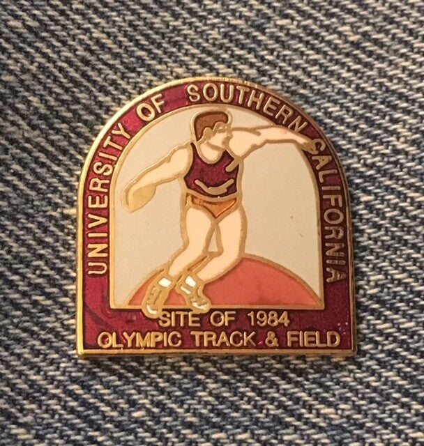 Discus USC venue pin from the 1984 Los Angeles Olympics on original card