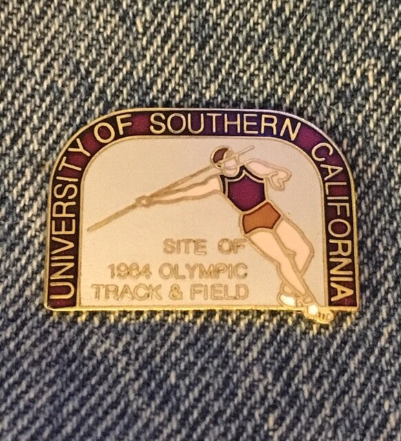 Javelin USC venue pin from the 1984 Los Angeles Olympics on original card